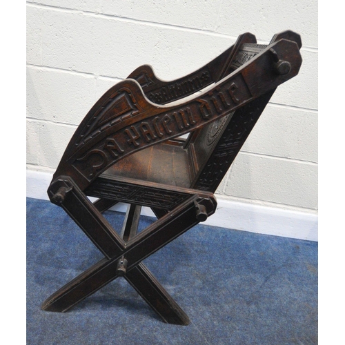 162 - A PAIR OF 20TH CENTURY OAK GLASTONBURY CHAIRS, with various carved details all over, shaped open arm... 