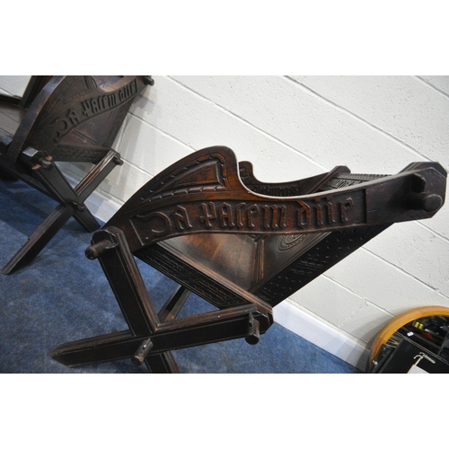 162 - A PAIR OF 20TH CENTURY OAK GLASTONBURY CHAIRS, with various carved details all over, shaped open arm... 