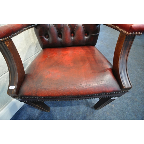 163 - A RED LEATHER BUTTON BACK GAINSBOROUGH CHAIR, with open armrests, width 55cm x depth 65cm x height 9... 