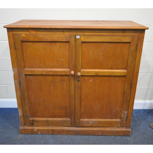 183 - A PINE DOUBLE DOOR CABINET, fitted with an arrangement of shelving, condition report: historical mar... 