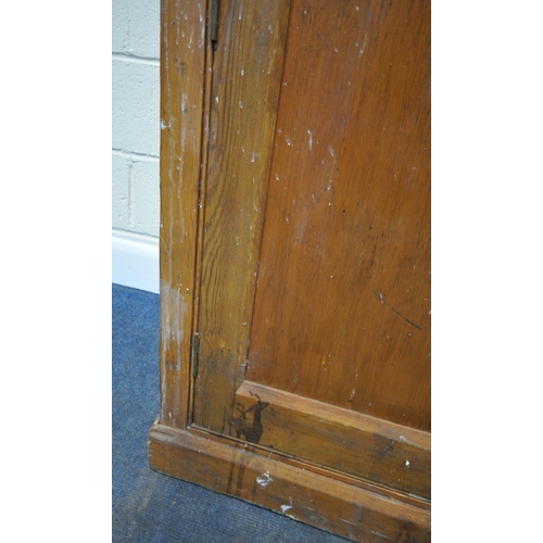 183 - A PINE DOUBLE DOOR CABINET, fitted with an arrangement of shelving, condition report: historical mar... 