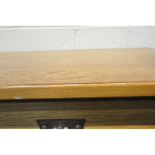 189 - A MODERN OAK SIDE TABLE, with two frieze drawers, raised on shaped legs, united by an undershelf, an... 