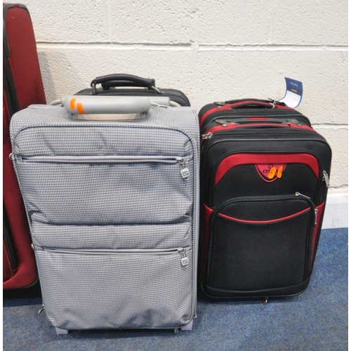 201 - A QUANTITY OF LUGGAGE, varying in size, colour, material, etc, comprising six suitcases, and a backp... 