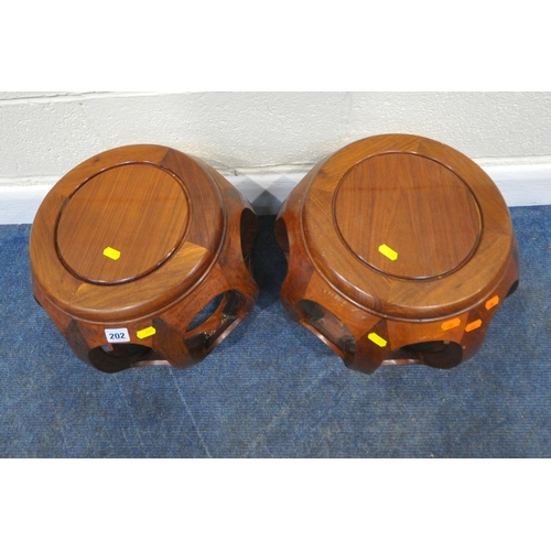 202 - A PAIR OF CHINESE HARDWOOD BARREL STOOLS, diameter 40cm x height 33cm, condition report: general sig... 