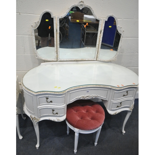 204 - A FRENCH WHITE PAINTED FOUR PIECE BEDROOM SUITE, comprising a kidney dressing table, with a triple m... 