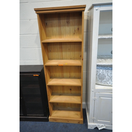 207 - A WHITE PAINTED OPEN BOOKCASE, with double doors, width 81cm x depth 45cm x height 183cm, a pine ope... 