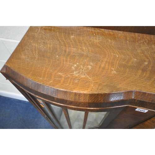 209 - A 20TH CENTURY OAK CHINA CABINET, with double cupboard doors, raised on cabriole legs, width 93cm x ... 