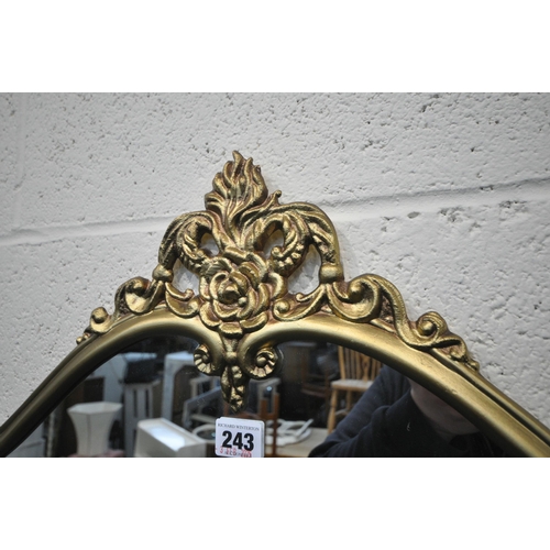 243 - A GOLD PAINTED METAL FRAME WALL MIRROR, with scrolled and foliate details, 80cm x 85cm, condition re... 