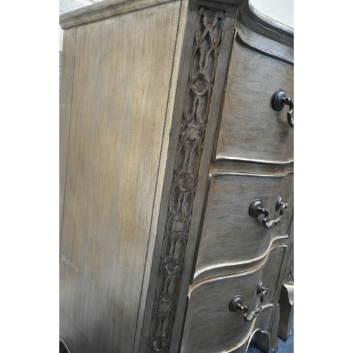 250 - AND SO TO BED, A PAIR OF GEORGIAN STYLE SILVER SERPENTINE BEDSIDE CHESTS, each with three drawers, a... 