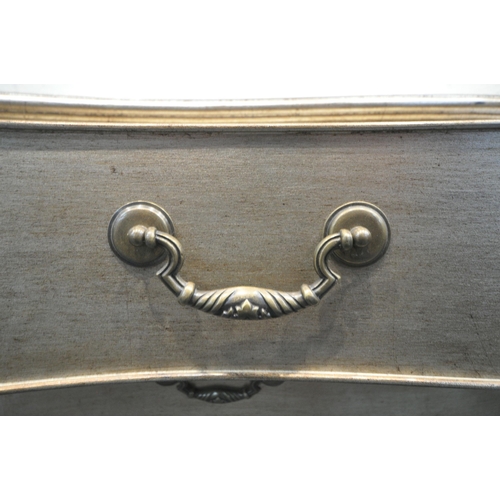 251 - AND SO TO BED, A GEORGIAN STYLE SILVER SERPENTINE CHEST OF FOUR LONG DRAWERS, with blind fretwork fr... 