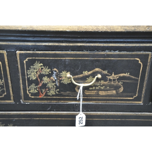 252 - A BLACK LACQUERED CHEST OF THREE SHORT OVER THREE LONG DRAWERS, with various chinoiserie decorative ... 