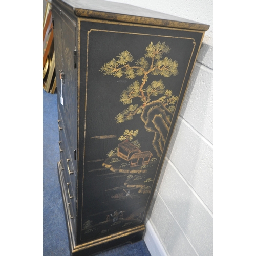 253 - A BLACK LACQUERED DRINKS CABINET, fitted with double cupboard doors, over three drawers, with variou... 