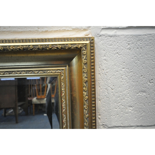 255 - TWO GILT FRAME RECTANGULAR WALL MIRRORS, largest 106cm x 76cm, condition report: general signs of we... 