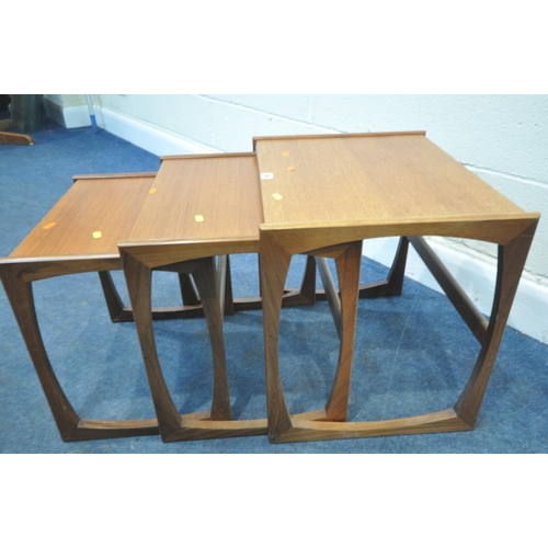 258 - A MID-CENTURY TEAK G PLAN QUADRILLE NEST OF THREE TABLES, largest table width 54cm x depth 44cm x he... 