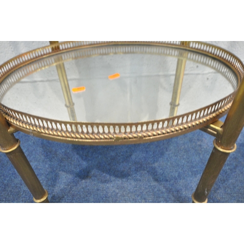 275 - IN THE MANNER OF MAISON BAGUES, A GILT METAL TWO TIER MIRRORED SIDE TABLE, the top removable tray wi... 