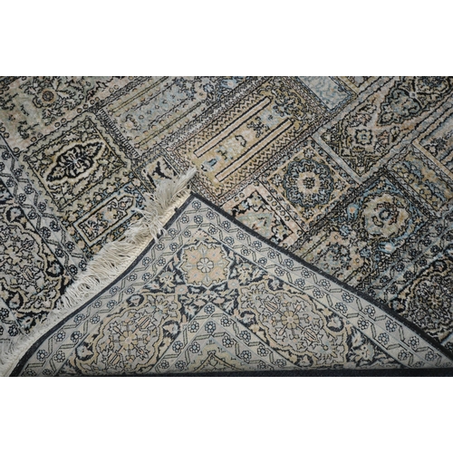 278 - A RECTANGULAR WOOLEN RUG, with various colours, geometric patterns, surrounded by a multi-strap bord... 