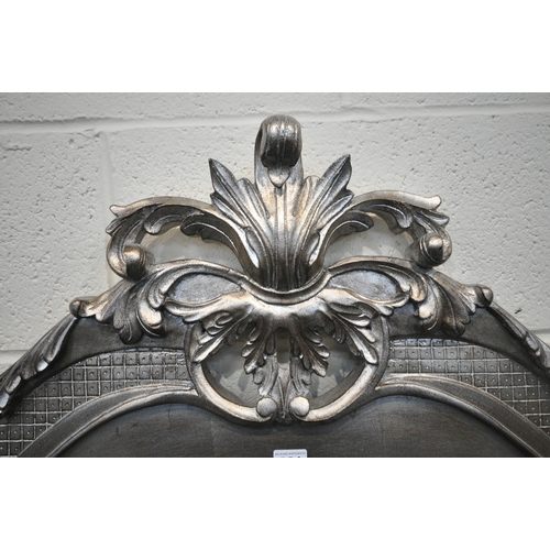 291 - AND SO TO BED, A LOUIS XVI STYLE SILVER 5FT BEDSTEAD, the headboard with intricate carved details, i... 