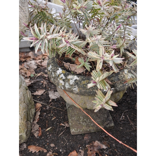 14 - THREE WEATHERED COMPOSITE GARDEN PLANTERS, two with fluted blustered bowls, the other with rope and ... 