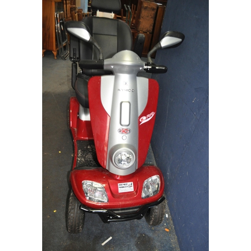 3 - A KYMCO FORU MOBILITY SCOOTER with charger, two keys, lights and indicators, rear and column baskets... 