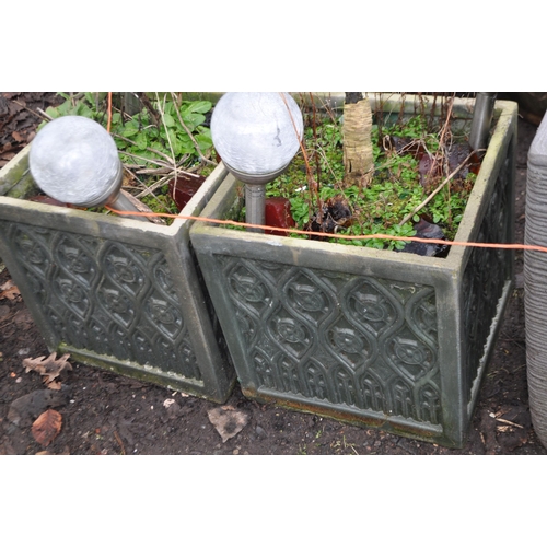 37 - THREE MODERN PLASTIC GARDEN PLANTERS including a pair of square pots with ecclesiastical detail to e... 