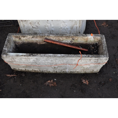 54 - THREE WEATHERED COMPOSITE LONG PLANTERS including a pair with pointed ends, 65cm long, 32cm wide and... 