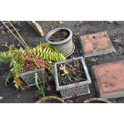 55 - THREE MOTTLE GLAZE GARDEN PLANTERS, AND FOUR POT BASES, Condition report one of the square pots has ... 