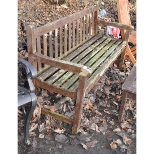 56 - A HARDWOOD GARDEN BENCH AND OCCASIONAL TABLE bench has slatted seat and back, width 152cm,  Conditio... 