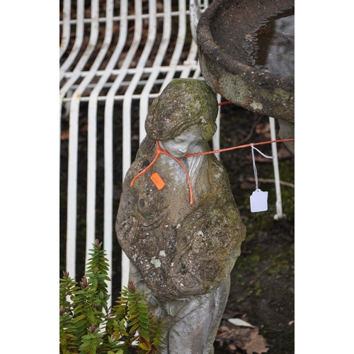 6 - TWO WEATHERED COMPOSITE GARDEN FIGURES comprising of a Roman flower seller 80cm high and a bird bath... 