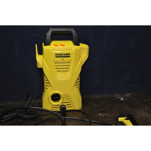 75 - A KARCHER K2 PRESSURE WASHER with lance and  brush (PAT pass and working)