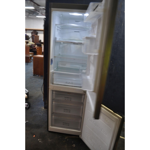 78 - A SAMSUNG RB31FDRNDSA FRIDGE FREEZER with stainless steel doors (PAT pass and working at 4 and -18 d... 