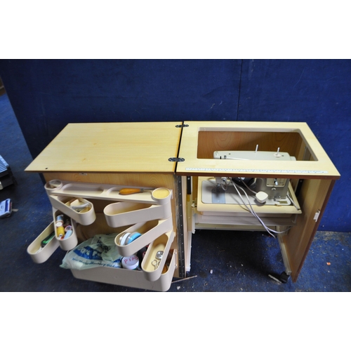 80 - A 1970s WALNUT SEWING CABINET BADGED HORN COLLECTION INTERNALLY with plastic trays and containing a ... 