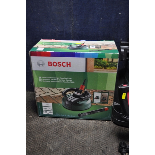 85 - A BOSCH ADVANCED AQUATAK 140 PRESSURE WASHER with lance, two attachments, shampoo bottle, a hose ree... 