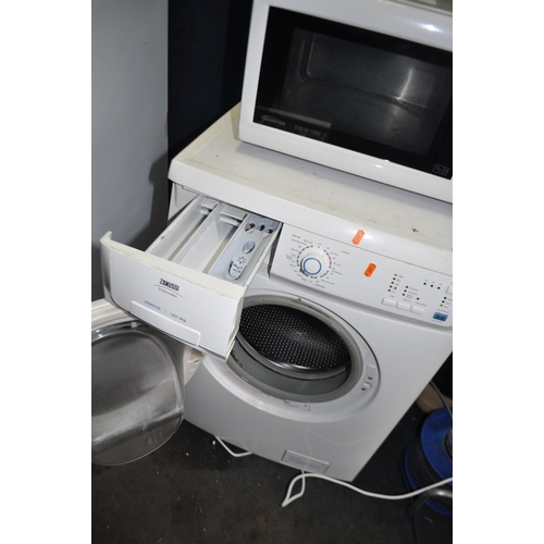 93 - A ZANUSSI ZWF114070W WASHING MACHINE width 60cm, depth 60cm, height 85cm (spin cycle run but not tes... 