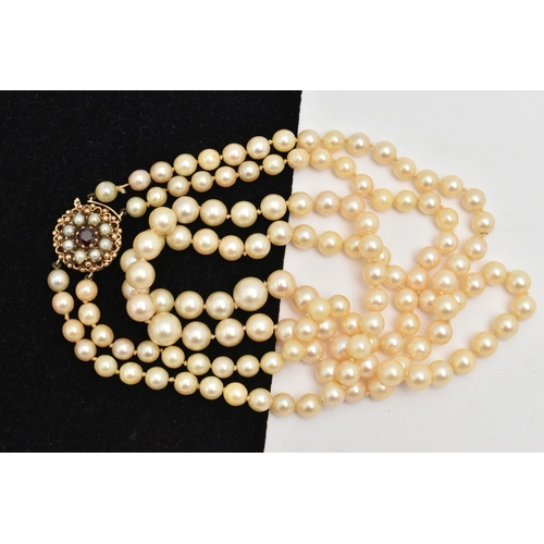 401 - A 9CT GOLD CULTURED PEARL NECKLACE, a double strand necklace of graduated white pearls with cream un... 