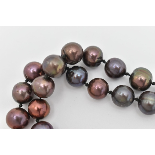 404 - A CULTURED BAROQUE PEARL NECKLACE, single strand of peacock coloured baroque pearls, each individual... 