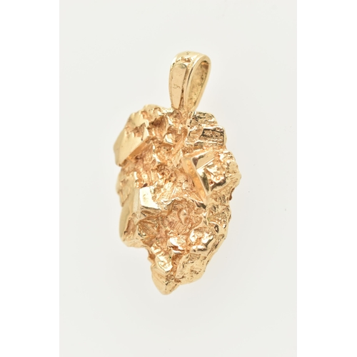 419 - A YELLOW METAL ROUGH PENDANT, gold nugget shaped pendant fitted with a tapered bail, stamped 14k, le... 