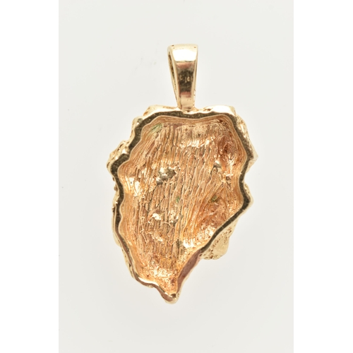 419 - A YELLOW METAL ROUGH PENDANT, gold nugget shaped pendant fitted with a tapered bail, stamped 14k, le... 