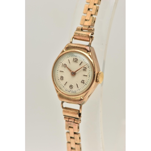 427 - A LADIES 9CT GOLD WRISTWATCH, manual wind watch, round silvered dial with alternating Arabic numeral... 