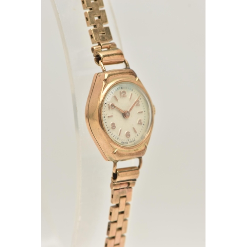 427 - A LADIES 9CT GOLD WRISTWATCH, manual wind watch, round silvered dial with alternating Arabic numeral... 