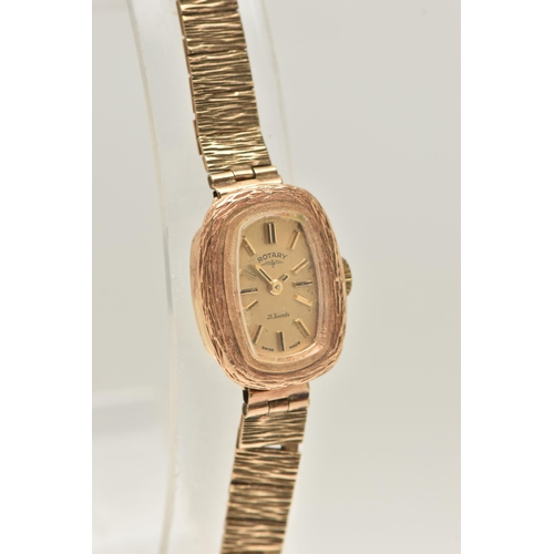 428 - A LADIES 9CT GOLD 'ROTARY' WRISTWATCH, manual wind, rounded rectangular gold tone dial signed 'Rotar... 