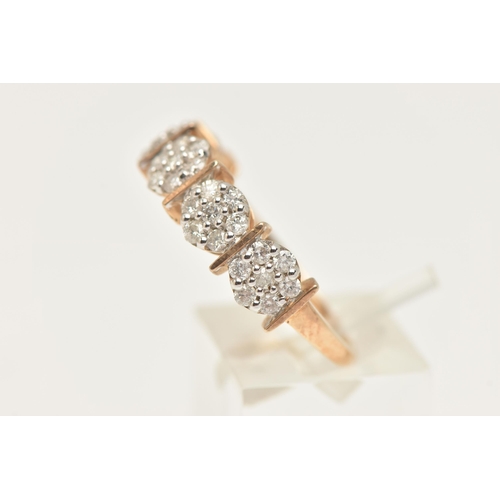 431 - A 9CT GOLD DIAMOND RING, designed as a row of five diamond clusters, each cluster between a polished... 