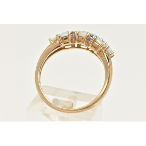 436 - A 9CT GOLD OPAL CLUSTER RING, ten oval cabochon opals prong set in yellow gold, with seven single cu... 