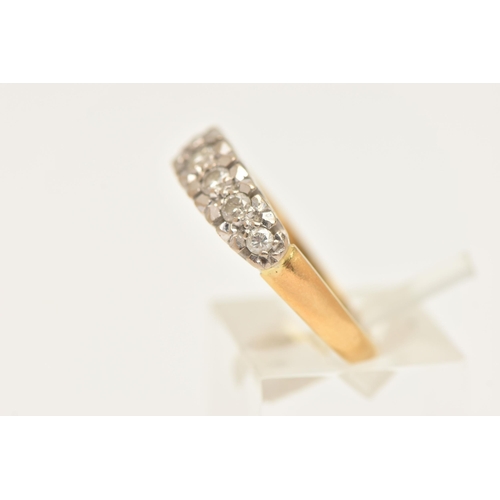 448 - AN 18CT GOLD DIAMOND RING, set with a row of seven graduating round brilliant cut diamonds, each in ... 