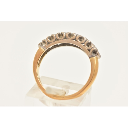 448 - AN 18CT GOLD DIAMOND RING, set with a row of seven graduating round brilliant cut diamonds, each in ... 