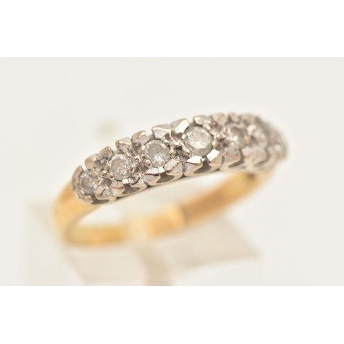 448 - AN 18CT GOLD DIAMOND RING, set with a row of seven graduating round brilliant cut diamonds, each in ... 