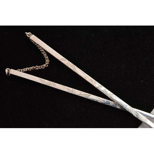 476 - A PAIR OF WHITE METAL CHOP STICKS, tapered chopsticks, etched with textured detail, chain linked tog... 