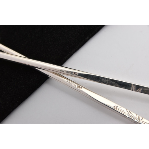 476 - A PAIR OF WHITE METAL CHOP STICKS, tapered chopsticks, etched with textured detail, chain linked tog... 