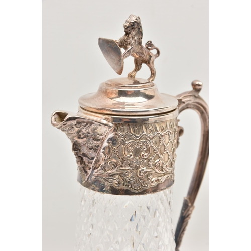 495 - A SILVER RIM DECANTER AND A CLARET JUG, a moulded glass decanter with a silver rim, hallmarked 'Isra... 