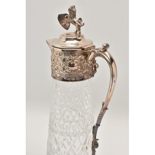 495 - A SILVER RIM DECANTER AND A CLARET JUG, a moulded glass decanter with a silver rim, hallmarked 'Isra... 