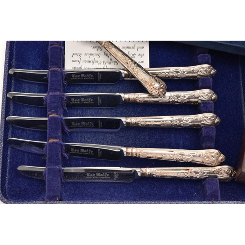 500 - AN ASSORTMENT OF SILVER CUTLERY, to include a cased set of six silver handled tea forks and a matchi... 